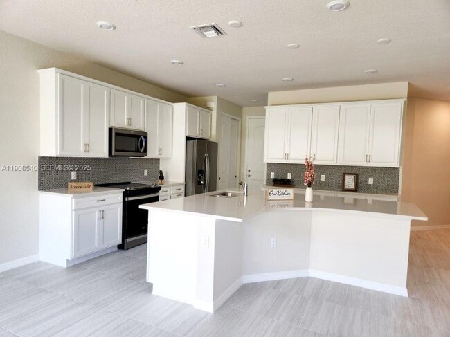 8189 Cinch Way in Greenacres, FL - Building Photo - Building Photo