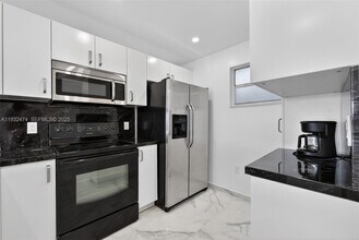 8250 Byron Ave in Miami Beach, FL - Building Photo - Building Photo