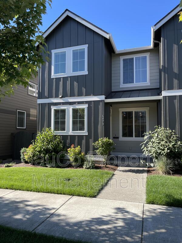 property at 6473 SE Genrosa St