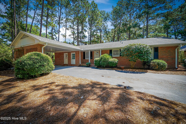 23 Pine Ridge Dr in Whispering Pines, NC - Building Photo - Building Photo