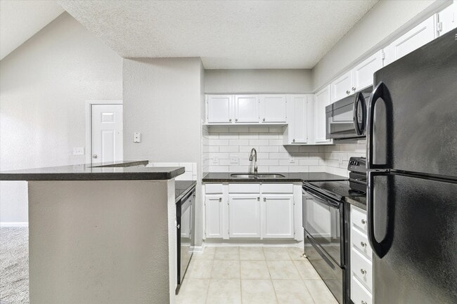 property at 1710 W T C Jester Blvd