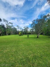 5930 Spanish Oaks Ln in Naples, FL - Building Photo - Building Photo