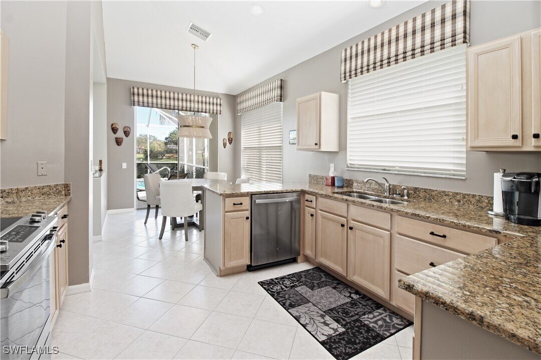 1842 Winding Oaks Way in Naples, FL - Building Photo