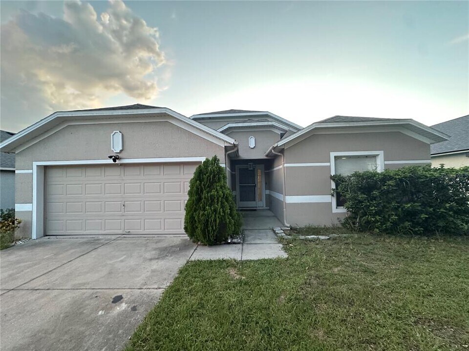 209 Aberdeen St in Davenport, FL - Building Photo