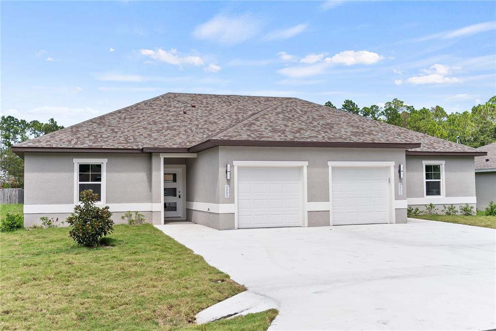 98 Wheatfield Dr in Palm Coast, FL - Building Photo