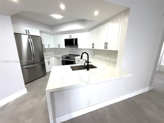 property at 6767 Collins Ave