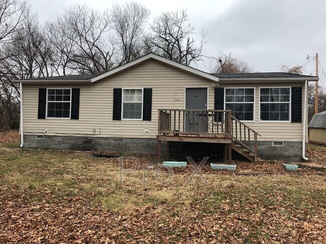 property at 1116 W 1st St