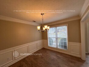 1042 Simon Park Cir in Lawrenceville, GA - Foto de edificio - Building Photo