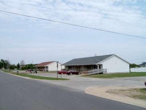 8665 Cedar River Rd in Mancelona, MI - Foto de edificio