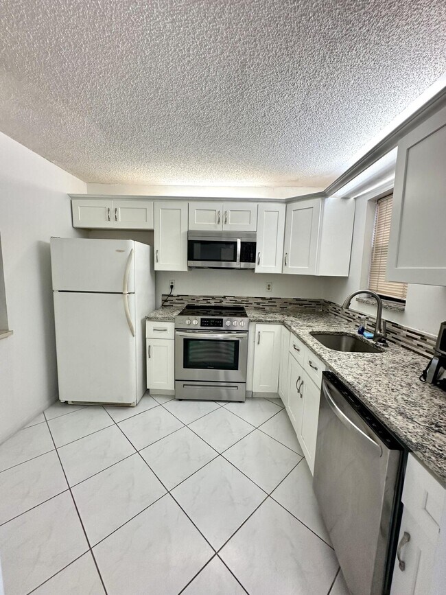 property at 9370 SW 8th St