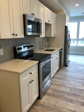 1464 Tremont St, Unit 404 in Boston, MA - Building Photo - Building Photo