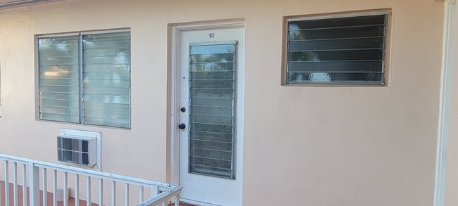 American Gardens Condominiums in Miami Beach, FL - Building Photo - Building Photo