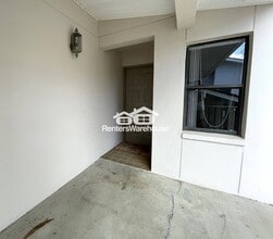 300 S Florida Ave, Unit Apt 100K in Tarpon Springs, FL - Building Photo - Building Photo