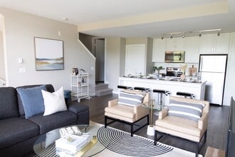 North & South Village Suites Apartments in Abbotsford, BC - Building Photo - Building Photo
