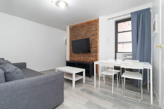309-311-311 E 95th St
