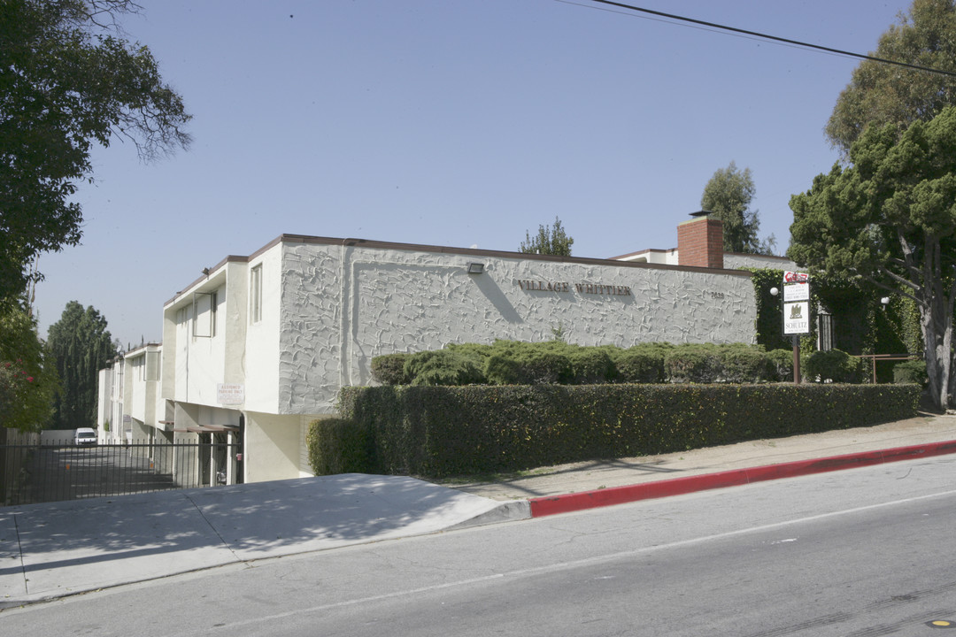 Village Whittier Apartments in Whittier, CA - Building Photo