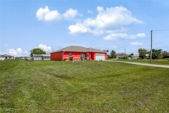 1228 NW 14th Pl in Cape Coral, FL - Building Photo - Building Photo