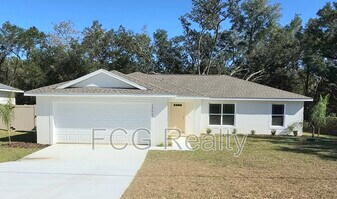 10663 N Adler Dr in Citrus Springs, FL - Building Photo