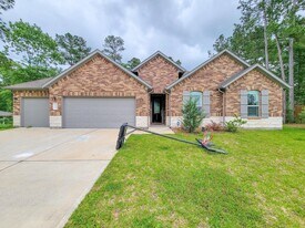 129 Jim Hall Ln in New Waverly, TX - Building Photo