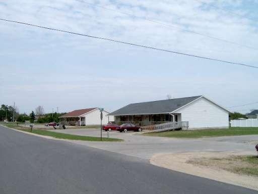 8597 Cedar River Rd in Mancelona, MI - Foto de edificio