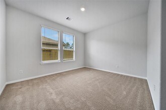 20082 Torrey Pines Ln in Cleveland, TX - Building Photo - Building Photo