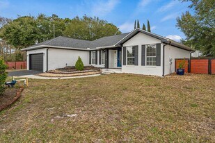 2187 Calle De Castelar in Navarre, FL - Building Photo