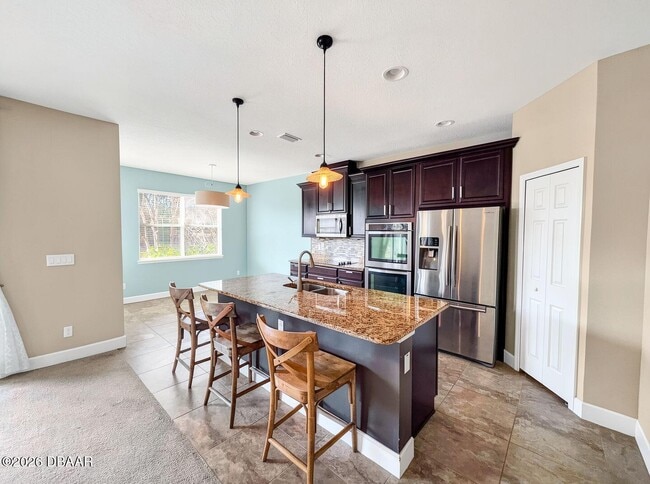 409 Grande Sunningdale Loop in Daytona Beach, FL - Building Photo - Building Photo