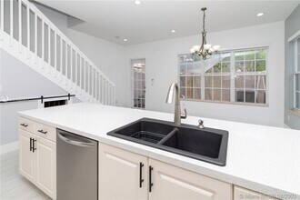 14711 SW 5th St-Unit -1-47 in Pembroke Pines, FL - Building Photo - Building Photo