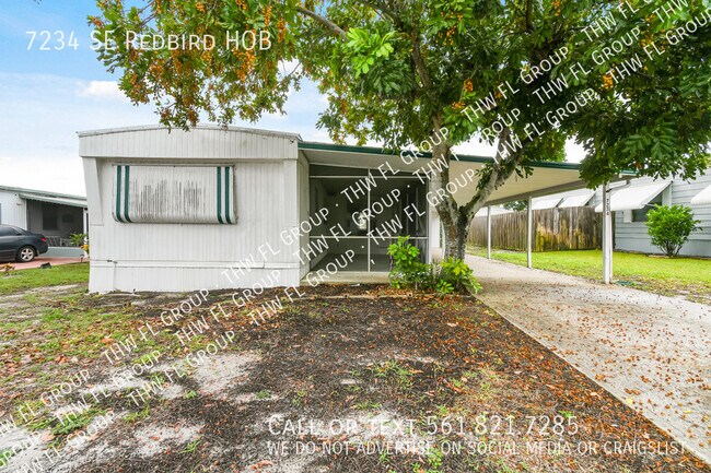 7234 SE Redbird Cir in Hobe Sound, FL - Building Photo - Building Photo