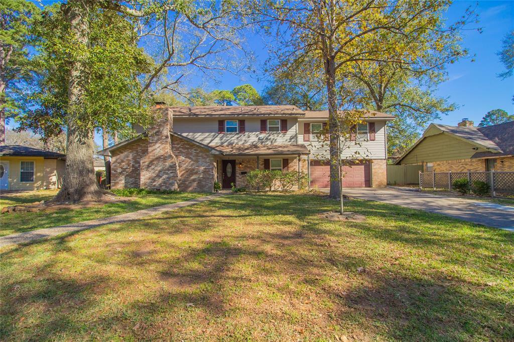 7 Woody Creek Dr in Conroe, TX - Building Photo
