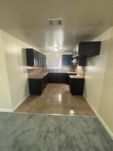 1229 W 60th St in Los Angeles, CA - Building Photo - Building Photo