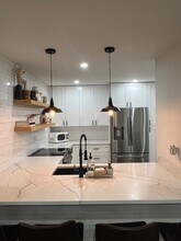 50 Emerald Woods Dr, Unit A9 in Naples, FL - Building Photo - Building Photo