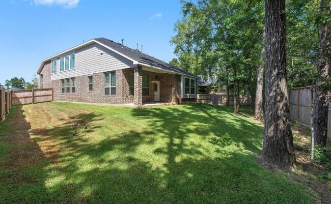 104 Windflower Track Ct in Willis, TX - Foto de edificio - Building Photo