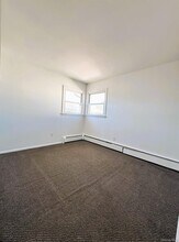 131 Roslyn Rd in Mineola, NY - Building Photo - Building Photo