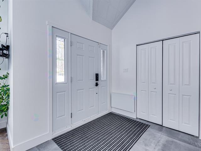 15 Rue de la Baie in Val-des-monts, QC - Building Photo - Building Photo