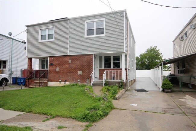 property at 64-32 136th St
