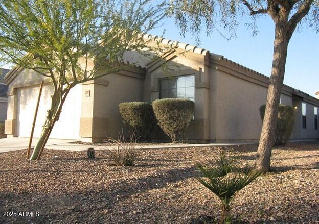 property at 23952 W Desert Bloom St