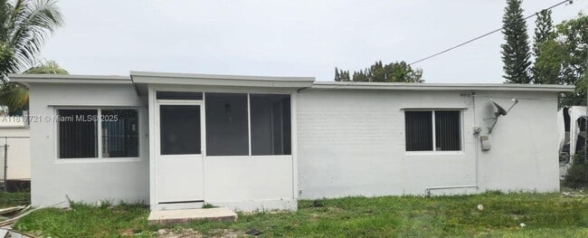 property at 7615 NW 4th Ct
