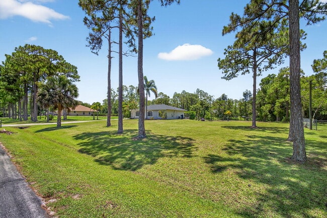 17354 64th Pl N in The Acreage, FL - Building Photo - Building Photo