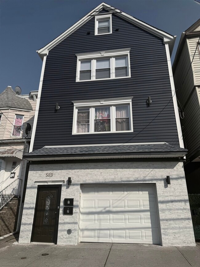 property at 583 John F. Kennedy Blvd