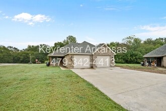 445 Oakwoods Dr in Elkins, AR - Building Photo - Building Photo