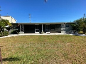394 N Spring Lake Blvd NW in Port Charlotte, FL - Building Photo - Building Photo