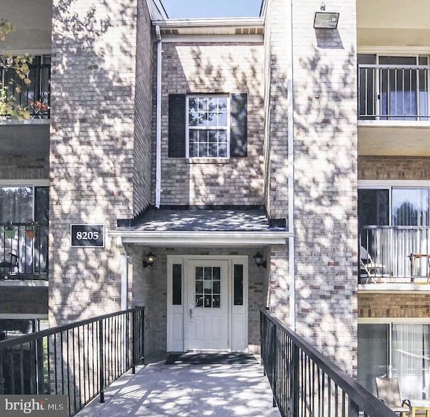 8205 Whispering Oaks Way, Unit 304 in Gaithersburg, MD - Building Photo