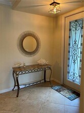 9495 Napoli Ln, Unit 101 in Naples, FL - Building Photo - Building Photo