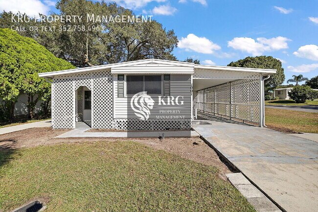 1001 Nell Way in Lady Lake, FL - Building Photo - Building Photo