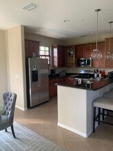 8997 Cambria Cir, Unit 2002 in Naples, FL - Building Photo - Building Photo