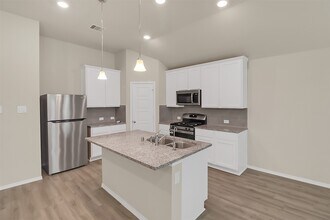 7710 Squall Ln in Mont Belvieu, TX - Building Photo - Building Photo