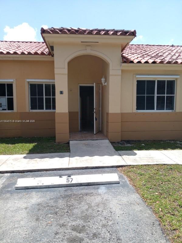 property at 57 NE 13th Ave