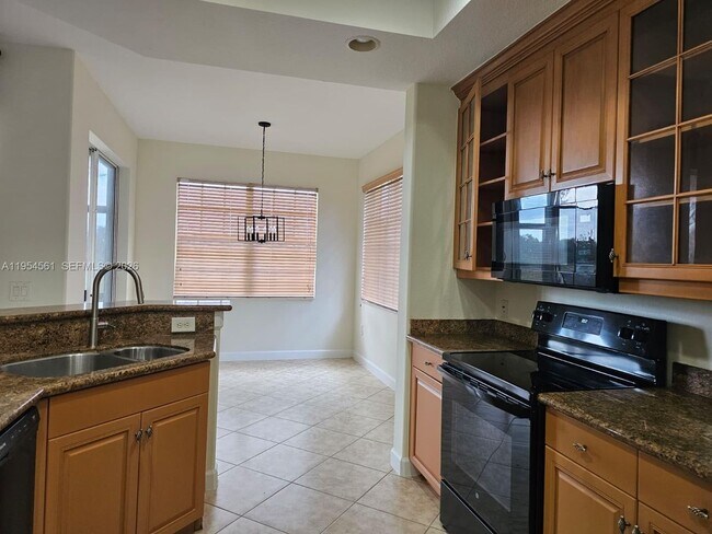 8255 NW 128th Ln in Parkland, FL - Building Photo - Building Photo