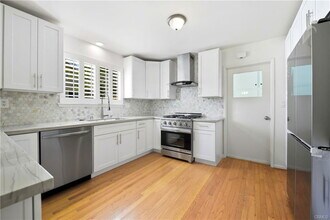 23416 Community St in Los Angeles, CA - Building Photo - Building Photo